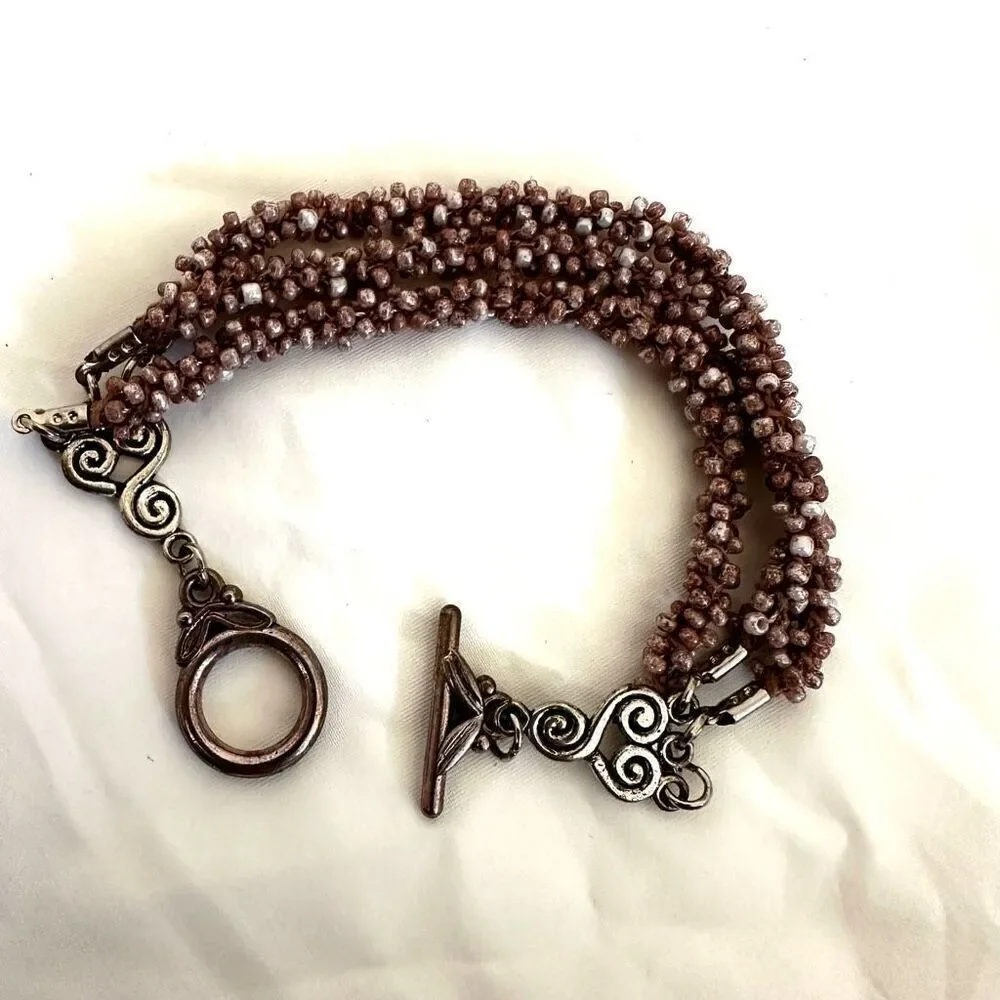 Triple strand seed beaded bracelet